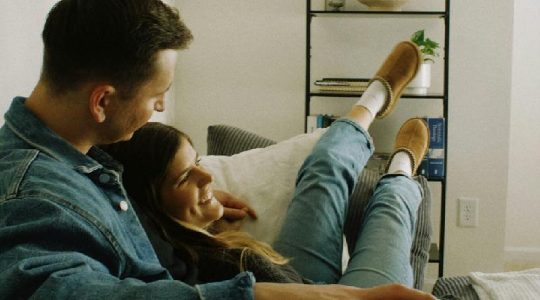 a man and woman on a couch