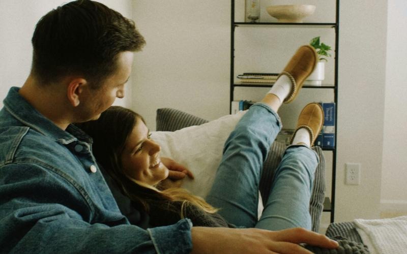 a man and woman on a couch