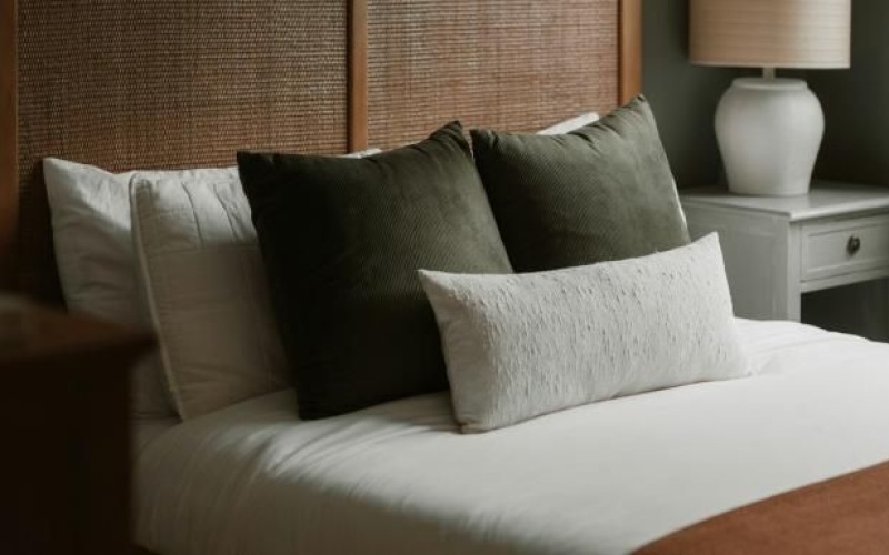 a bed with pillows
